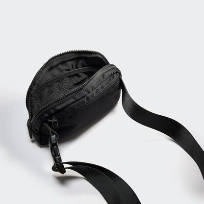Pander Two Way Zipper Fanny Pack Nylon Everywhere Belt Bag for Women, Water Repellent Waist Packs, Crossbody Bags with Adjustable Strap (Black). | 1L nylon belt bag with a two-way zipper, three interior mesh pockets, and an adjustable strap for waist or c