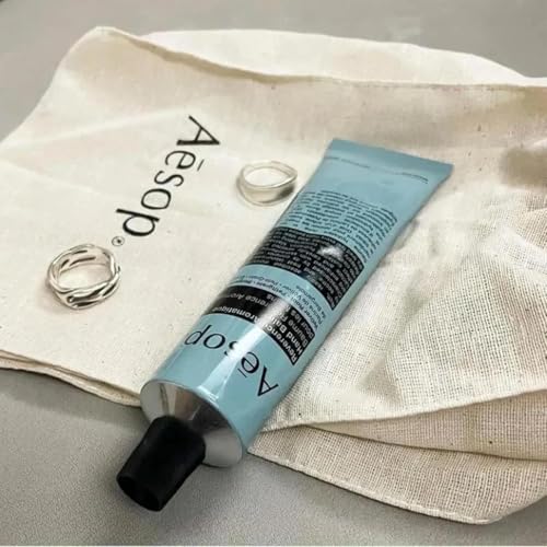 Aesop Reverence Aromatique Travel Size Hand Balm | Lotion that Gently Exfoliates Dry Hands + Nourishes with Macadamia Seed Oil and Shea Butter | 2.4 oz / 75 mL - style: Reverence