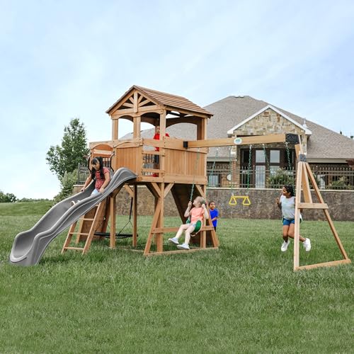 Backyard Discovery Sterling Point Cedar Wood Swing Set with Wave Slide, Raised Clubhouse, Wooden Bridge, Rock Wall, Belt Swings, Web Swing, Trapeze, Balcony, Climbing Wall, Ladder, Outdoor Playset - color: Grey Slide, style: Cedar