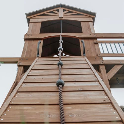 Backyard Discovery Sterling Point Cedar Wood Swing Set with Wave Slide, Raised Clubhouse, Wooden Bridge, Rock Wall, Belt Swings, Web Swing, Trapeze, Balcony, Climbing Wall, Ladder, Outdoor Playset - color: Grey Slide, style: Cedar